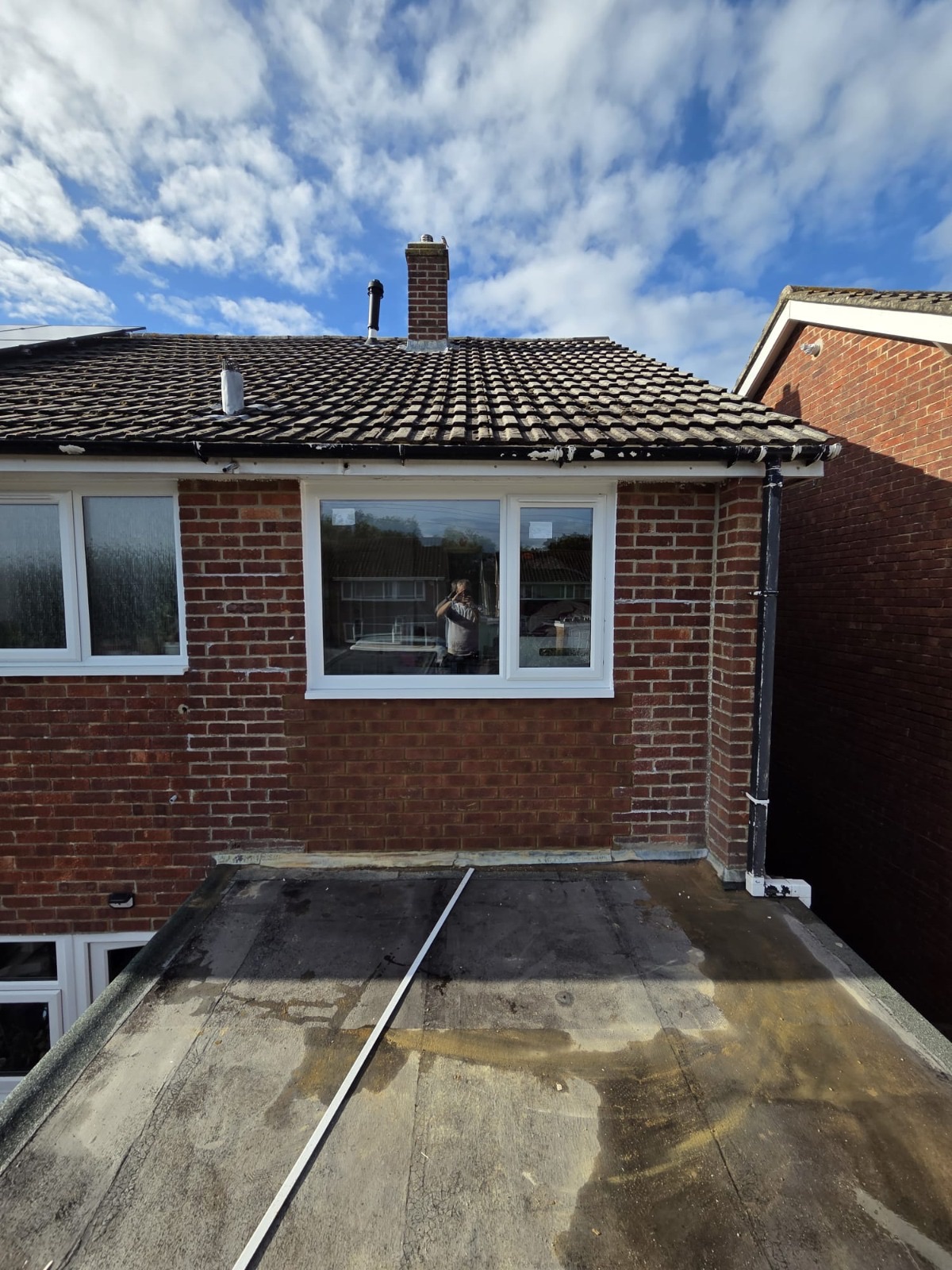 Finished extension with brickwork made good around a new window