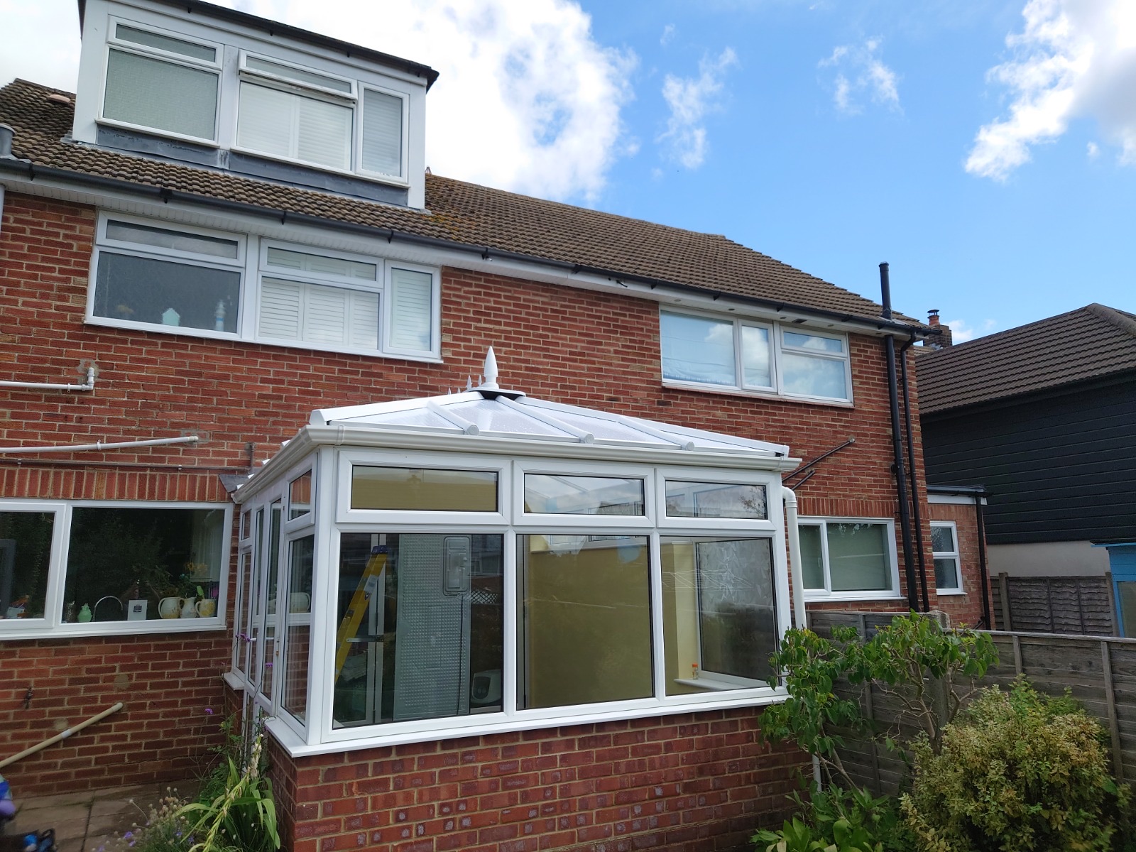 Conservatory roof fitted by HDS, finished with a lantern spire