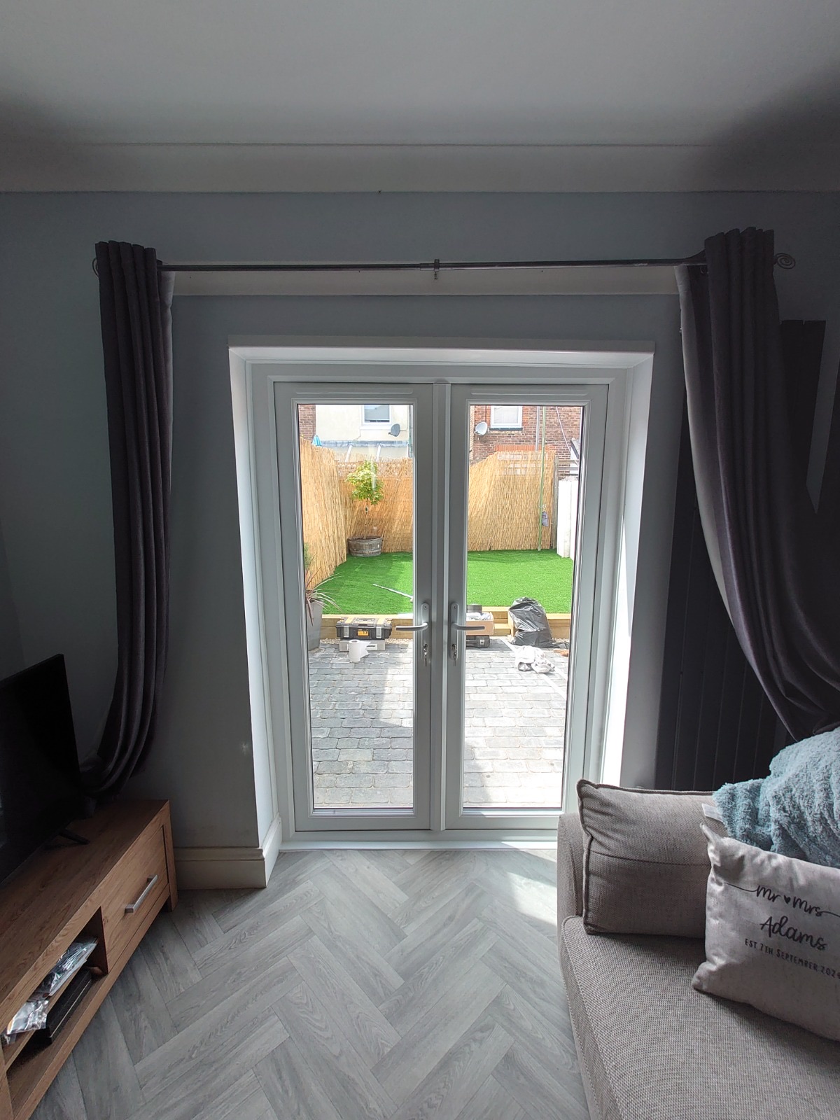 uPVC French doors opening onto the garden, fitted by HDS