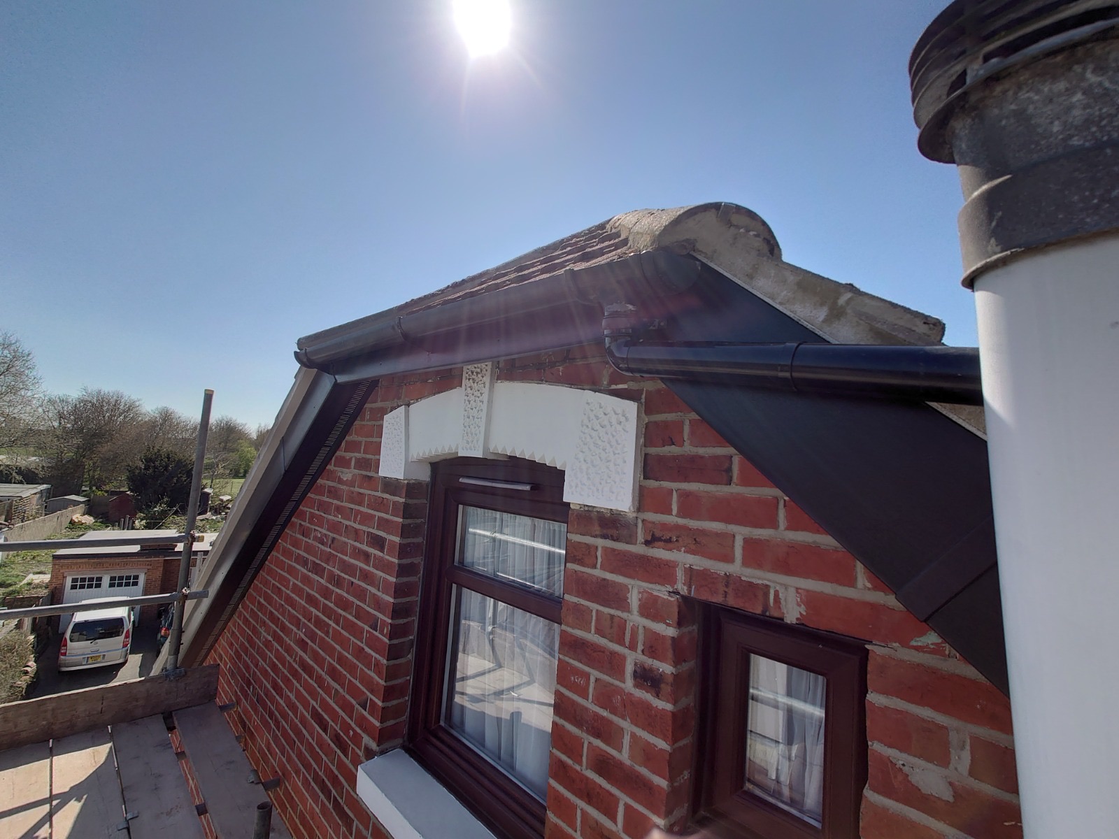 Fascia and guttering fitted by HDS under a gable end